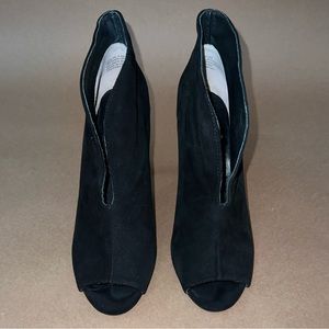 STEVEN Black suede peep toe booties with gold accent.